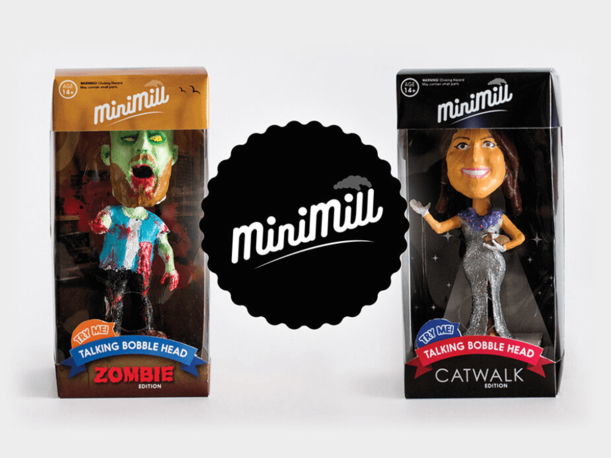 The 3D printed bobble head designs in the MiniMill packaging